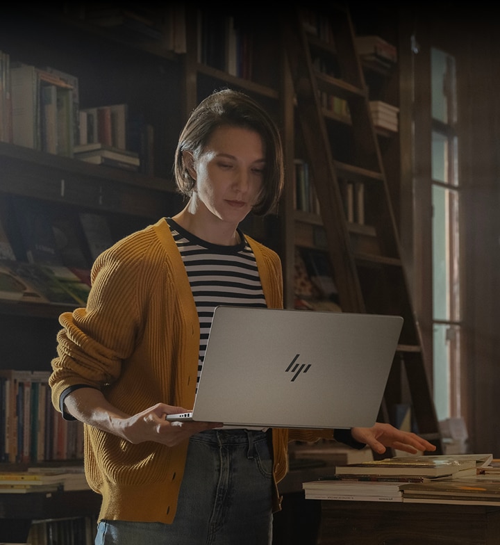 A women using laptop in a library