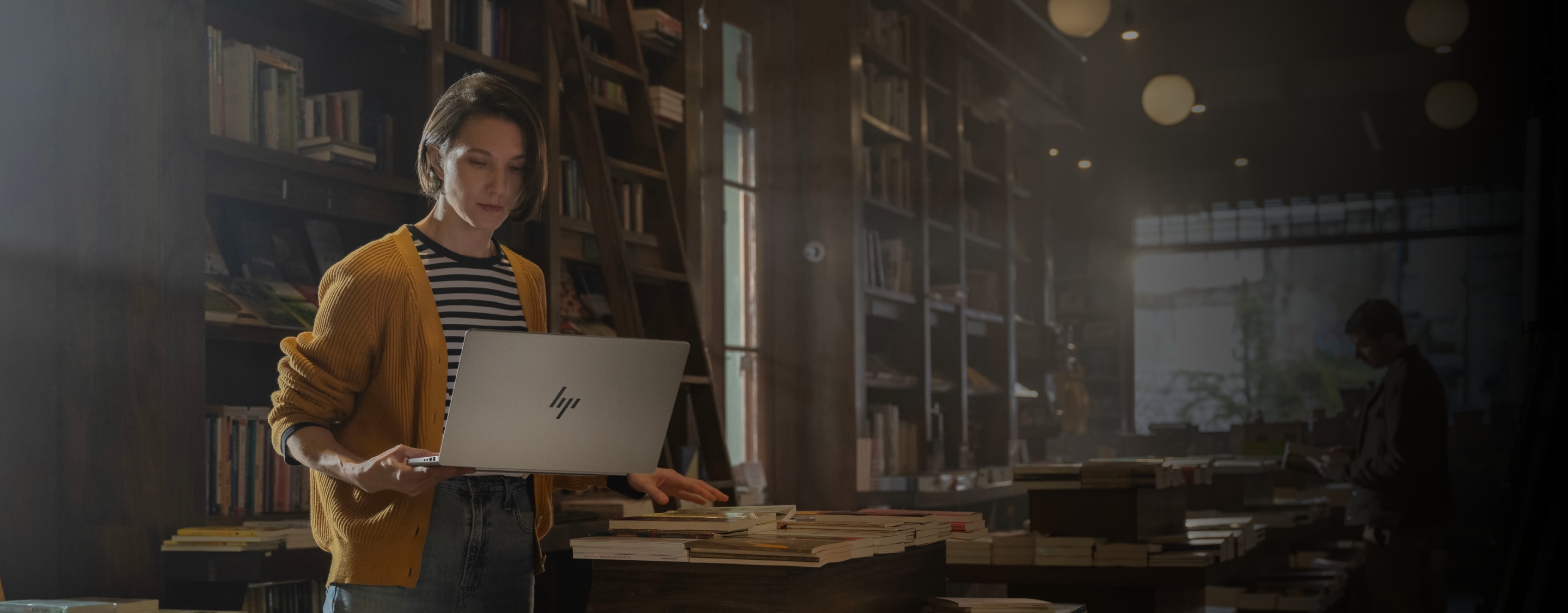 A women using laptop in a library